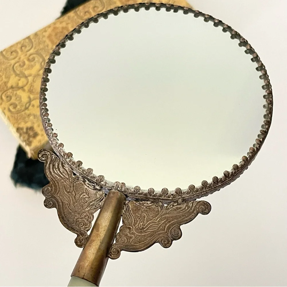 Vintage hand held vanity mirror jade handle silver tone birds floral metal